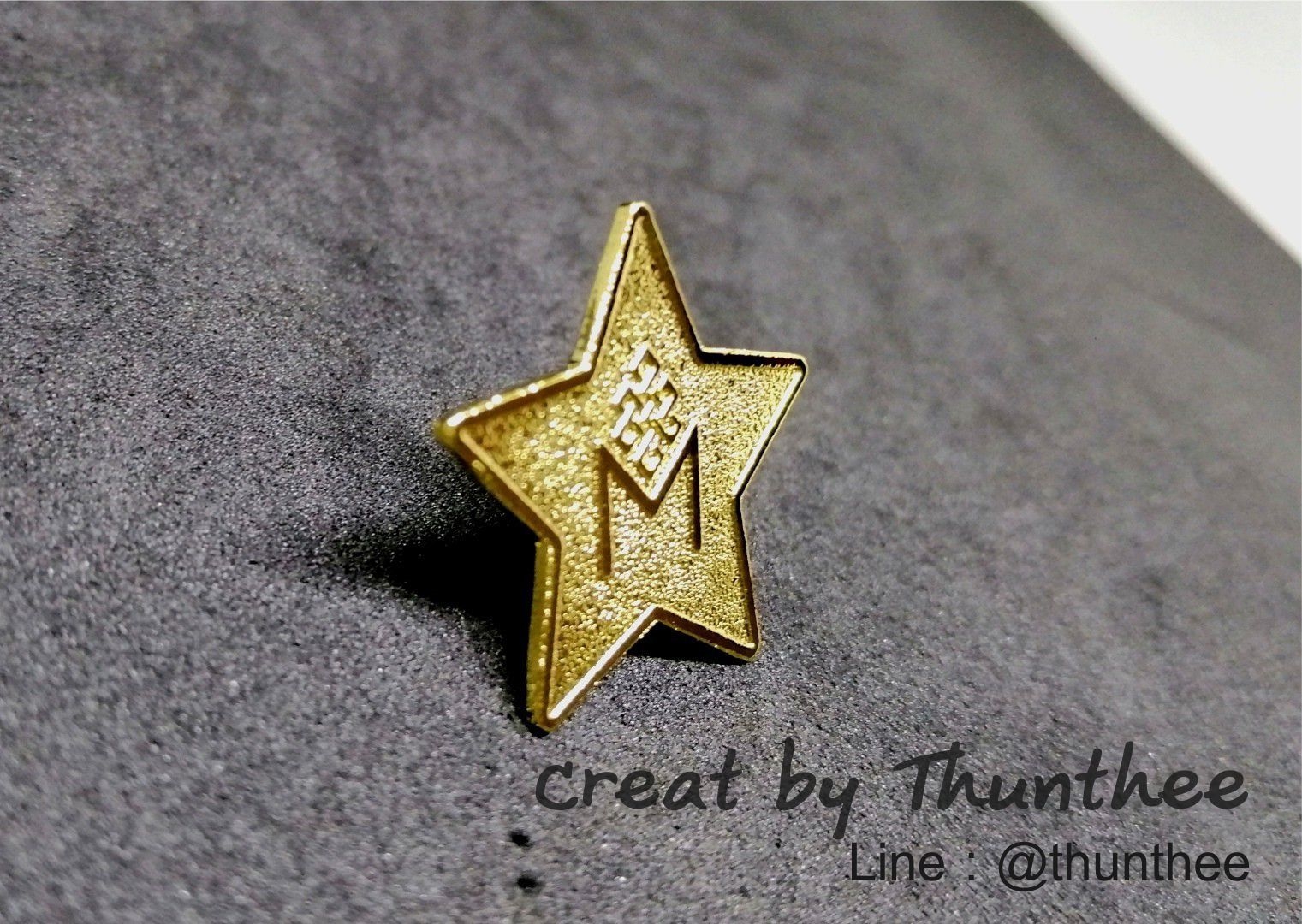 เข็มกลัดเม็ดทราย