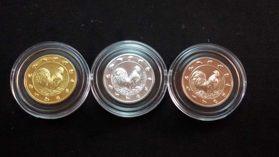 เหรียญปฎิทิน ปีระกา พศ.2560 ชุด 3 เหรียญ ทอง เงิน นาค
