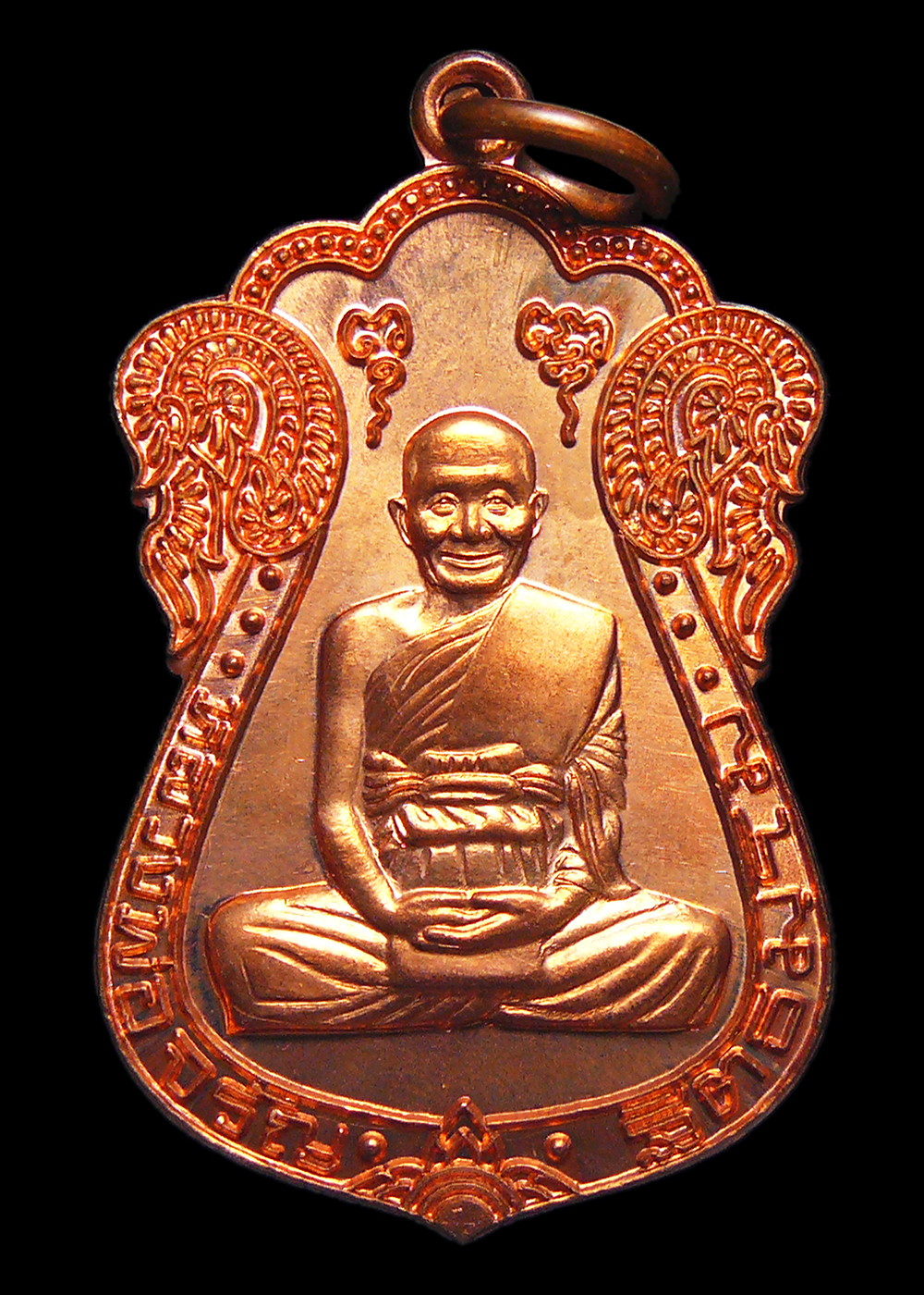 เหรียญหลวงพ่อจรัญ วัดอัมพวัน จ.สิงห์บุรี ปี2554 ทองแดงผิวไฟ