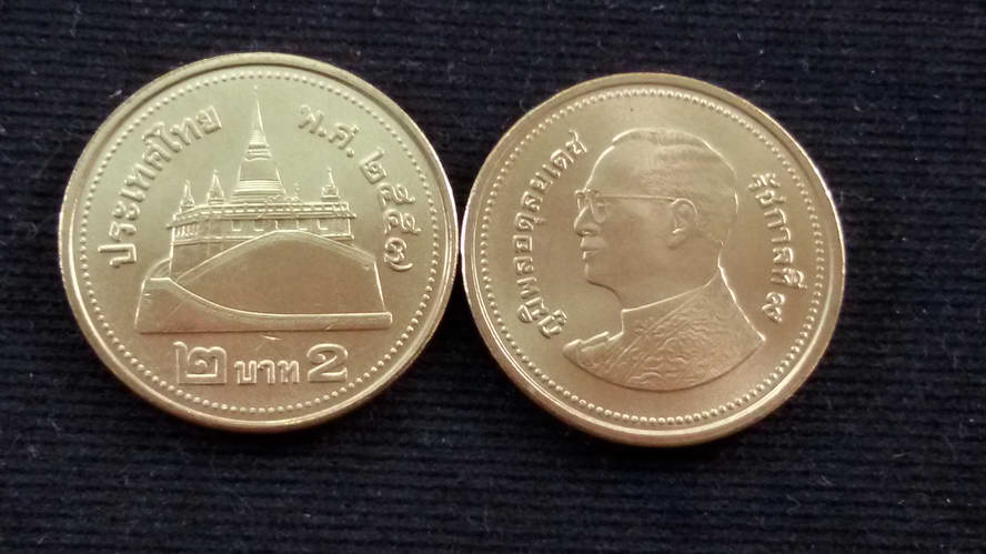 เหรียญ 2 บาทสีทองปี2557 สภาพใหม่UNCหายากลำดับ1