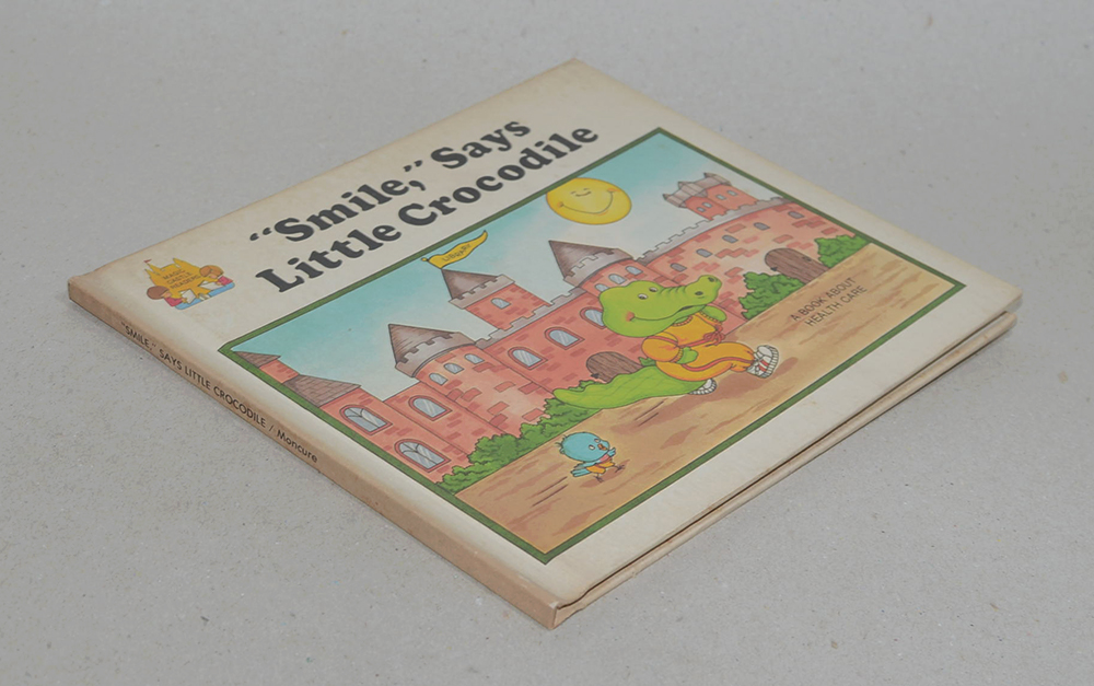 “Smile,” Says Little Crocodile